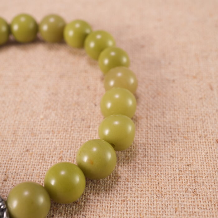 Close-up of Green Alashan Beads and Silver Accents – Revitalizing Crystal Bracelet