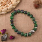 Ruby & Jasper Bracelet on Stone Surface – Symbol of Strength and Passion