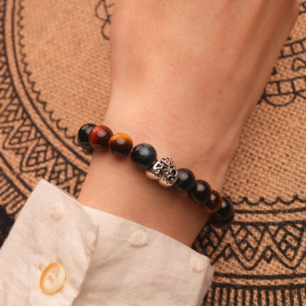Tiger Eye heart bracelet worn on wrist with natural lighting