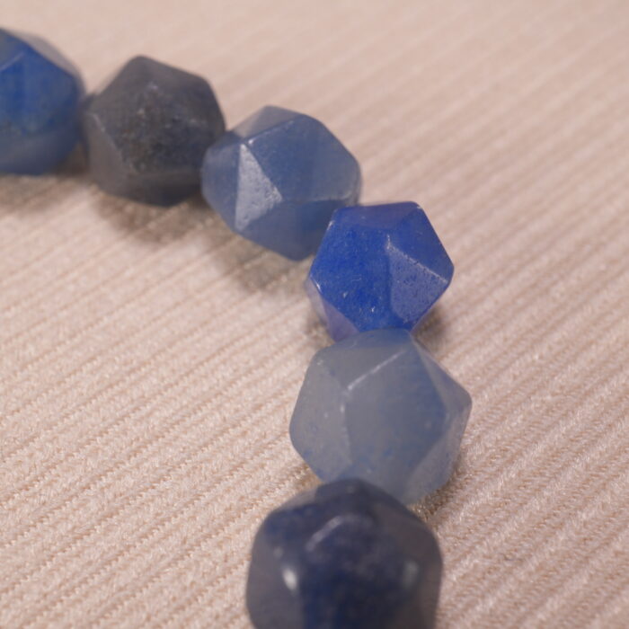 Close-up of bead texture and elastic cord connection, highlighting craftsmanship.