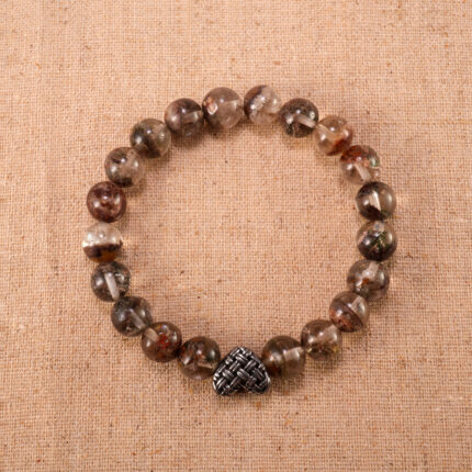 Phantom Quartz gemstone heart bracelet with 8mm beads and silver clasp on white background