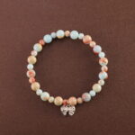 Natural Shoushan stone beaded bracelet displayed on white background