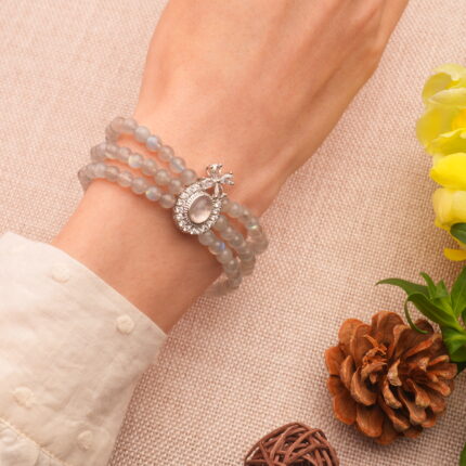 Triple-Layer 6mm Moonstone Bracelet worn on wrist – Elegant and Comforting Fit