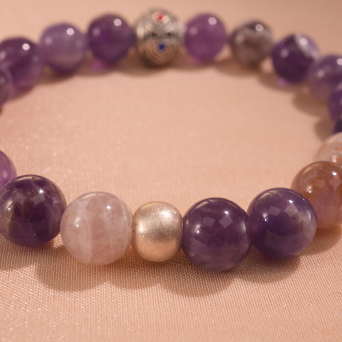 Close-up of smooth amethyst beads with rich purple hues