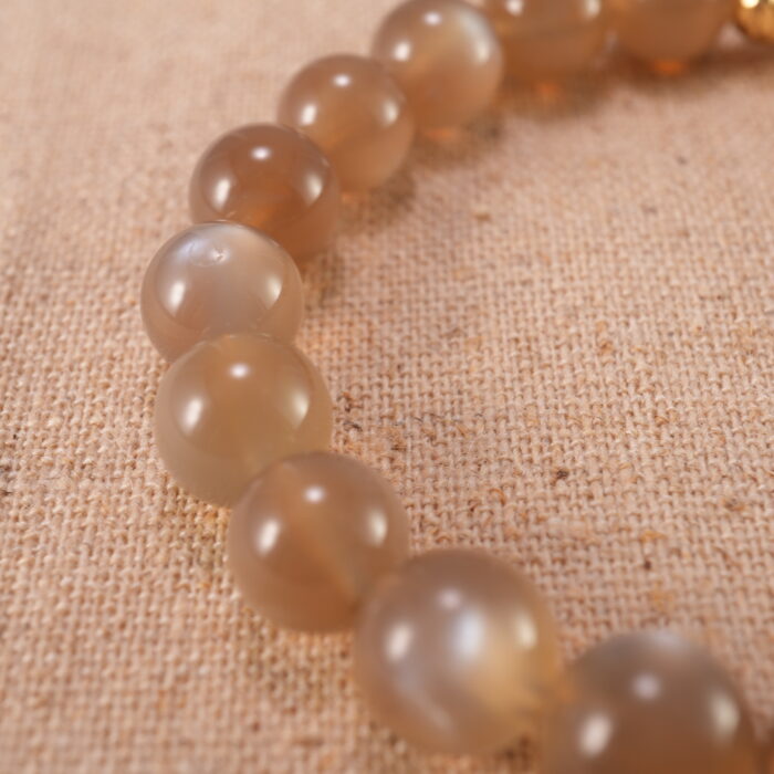 Close-up of smooth, glowing moonstone beads