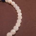 Close-up of deep blue lapis and soft white chalcedony beads