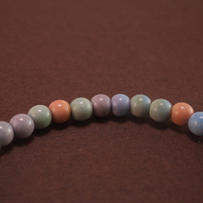 Close-up of Alashan agate bracelet with silver detail.