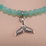 Close-up of amazonite bracelet with silver accents.