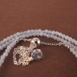 Close-up of aquamarine beads and clasp detail.
