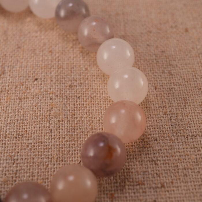 Close-up of aventurine bracelet with S925 silver bead accents.