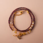 Deep red Garnet beaded multi-use necklace, designed to wrap elegantly as a bracelet.
