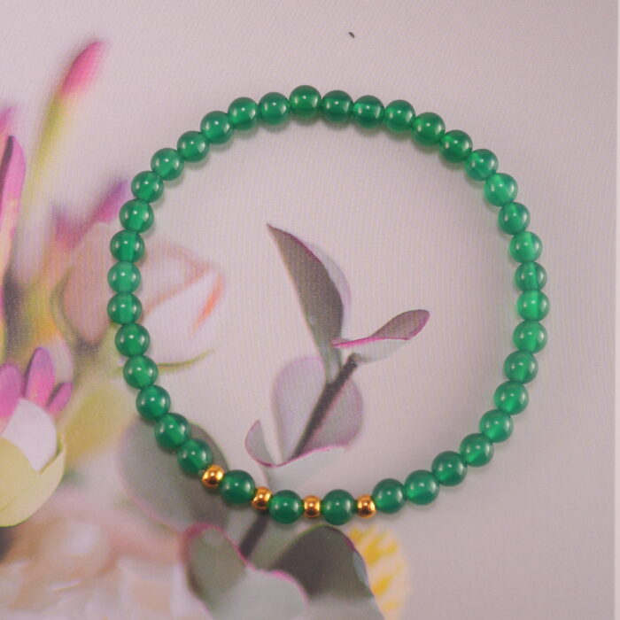 Bracelet in soft daylight showing fresh green tone.