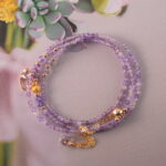 Amethyst wrap bracelet fully extended, showing full length and necklace-to-bracelet versatility.