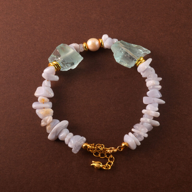 Handmade Cancer bracelet featuring Blue Lace Agate, pearl, and aquamarine in a calming pastel palette.