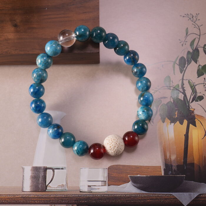 Detailed view highlighting the contrast between fiery red agate and cool blue fluorite.