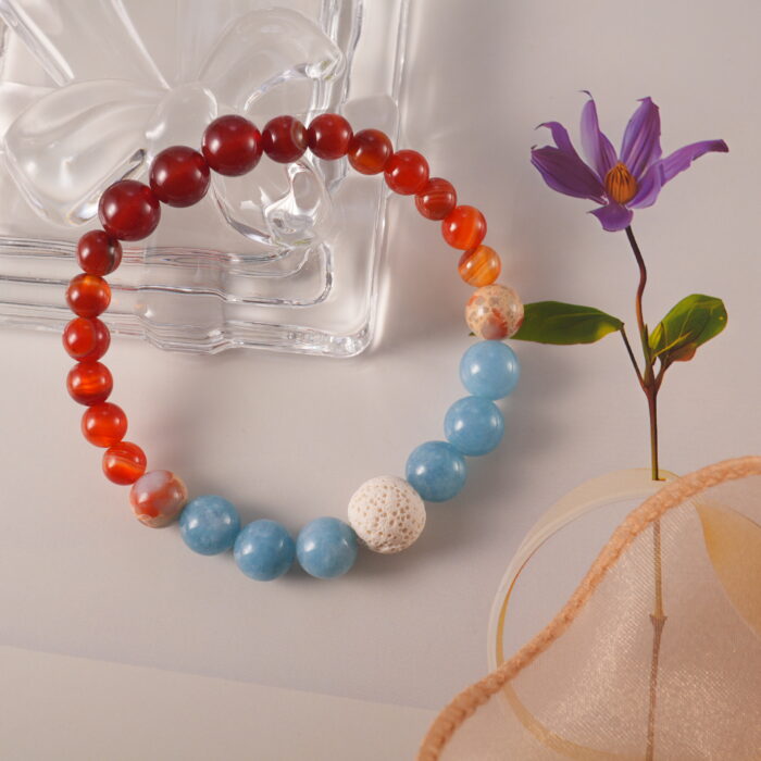 Detailed image showing the harmonious blend of Red Agate, Shoushan Stone, and Blue Chalcedony beads in the handmade design.