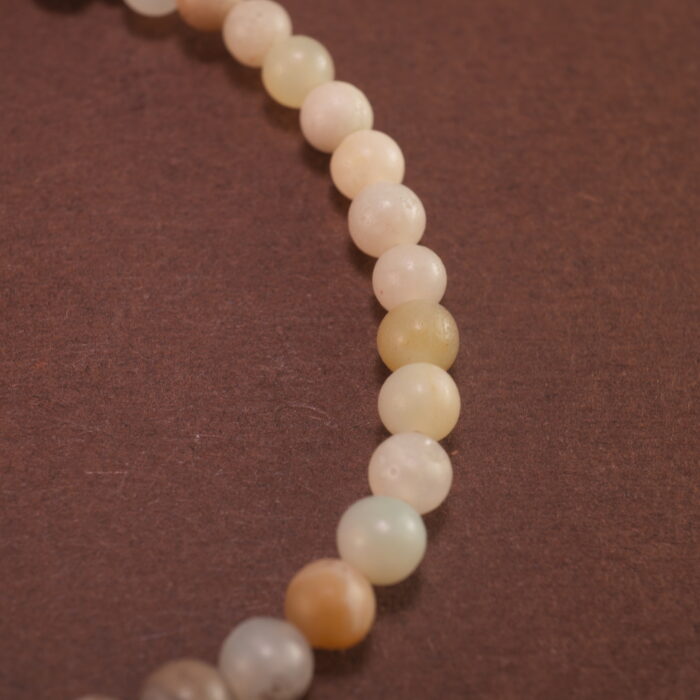 Close-up of multicolor amazonite bracelet with silver.