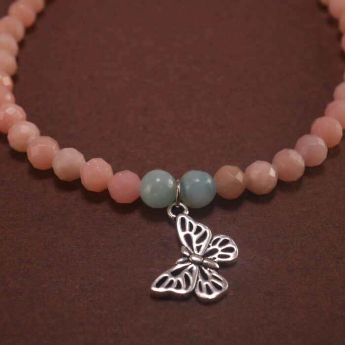Close-up of pink and blue chalcedony bracelet with silver.