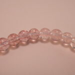 Close-up of strawberry quartz bracelet with silver.
