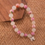 White chalcedony and rainbow fluorite bracelet in natural light.