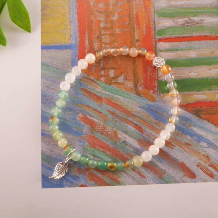 Bracelet in daylight showing soft yellow-green transparency.