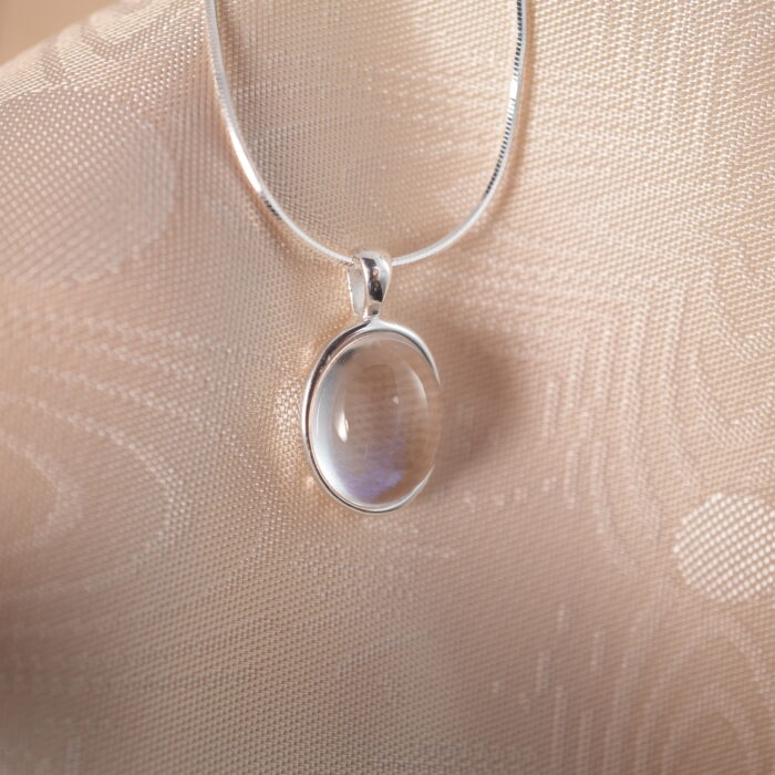 Close-up of moonstone pendant details with iridescent sheen