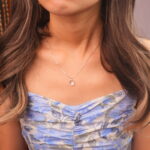 Model wearing moonstone pendant